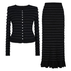 Black knit cardigan and midi skirt set with rhinestone embellishments.