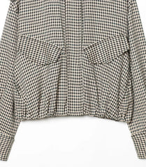 Gingham check shirt with two front pockets on a white background