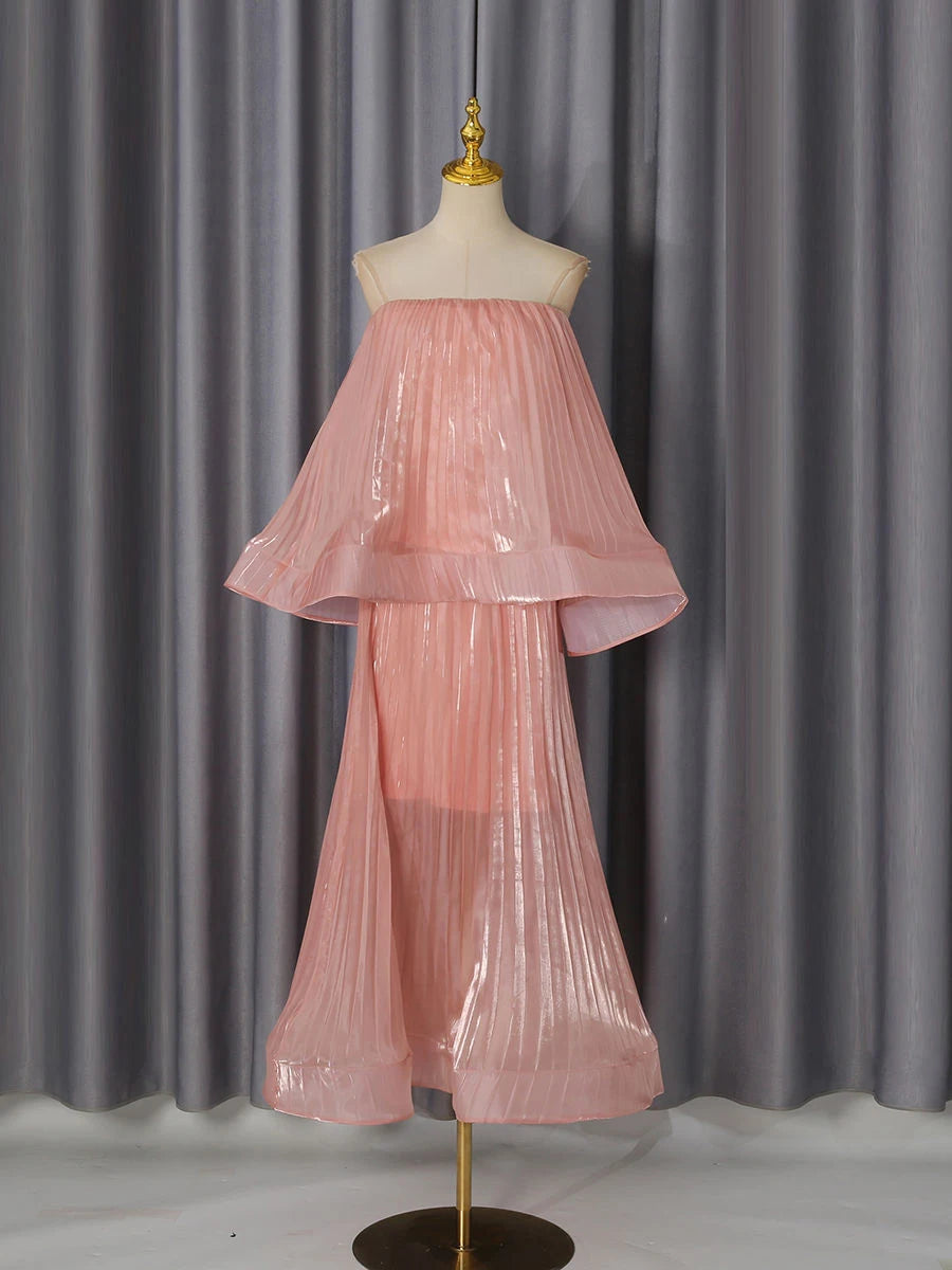 Strapless top and pleated midi skirt set displayed on mannequin