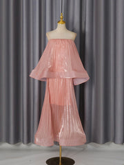 Strapless top and pleated midi skirt set displayed on mannequin