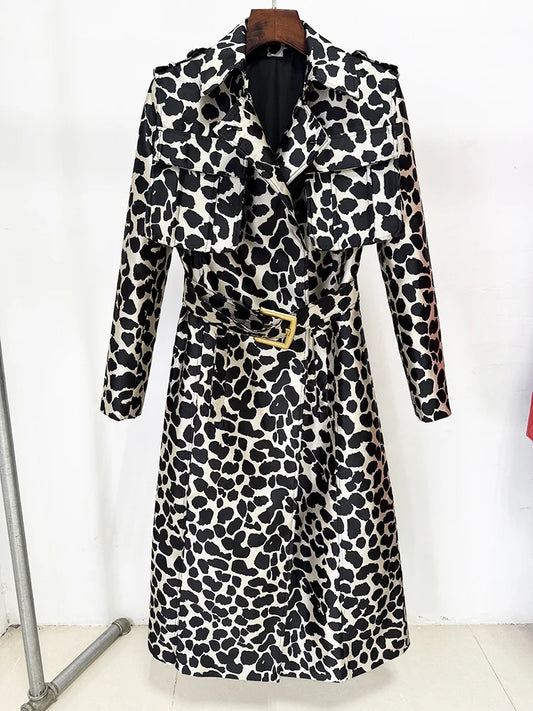 Leopard print belted trench coat hanging on a rack
