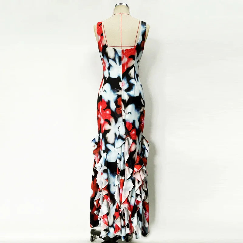 Colorful floral dress on a mannequin against a white background