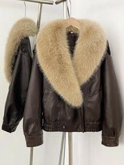 Faux leather bomber jacket with a large beige faux fur collar displayed on a hanger
