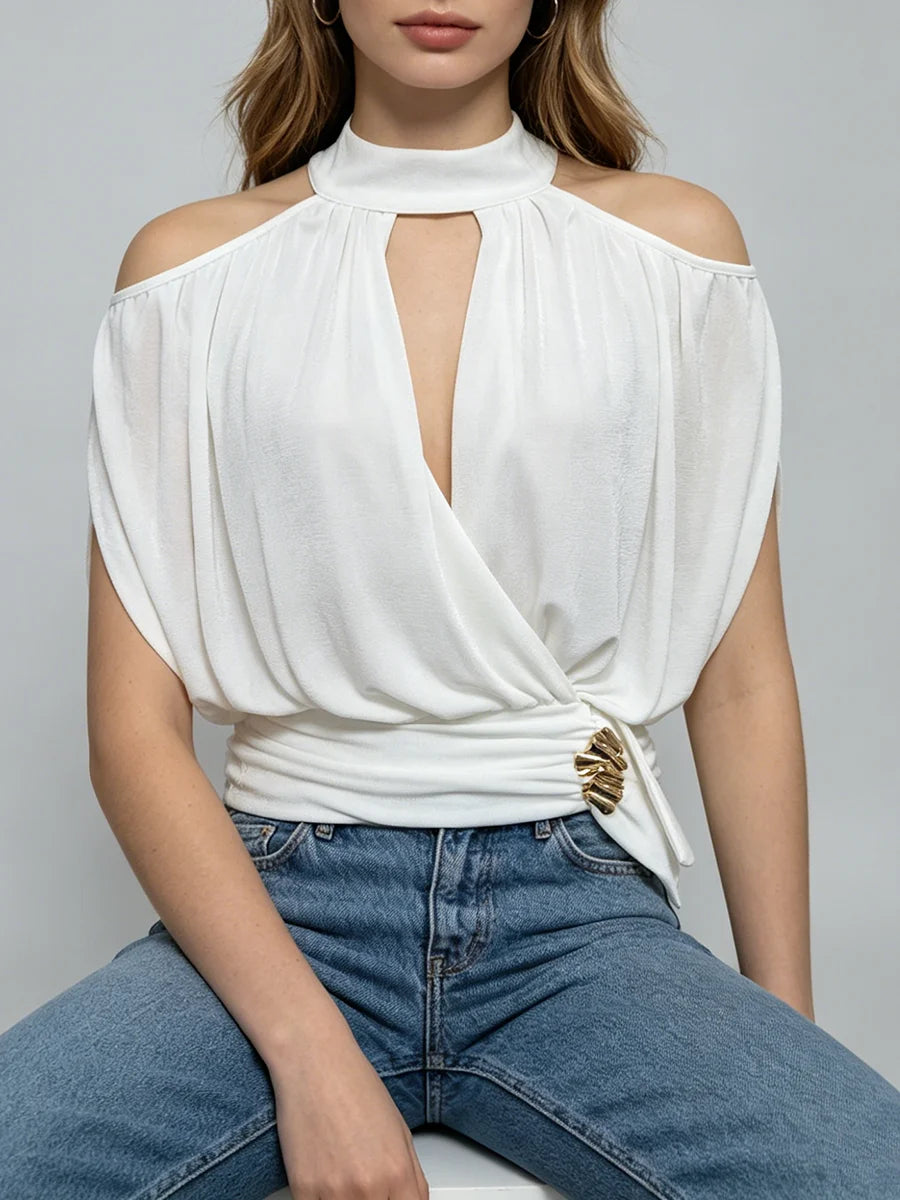 Close-up of white draped halter neck cold shoulder top