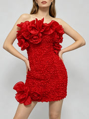 Strapless ruffled floral mini dress with hands on hips