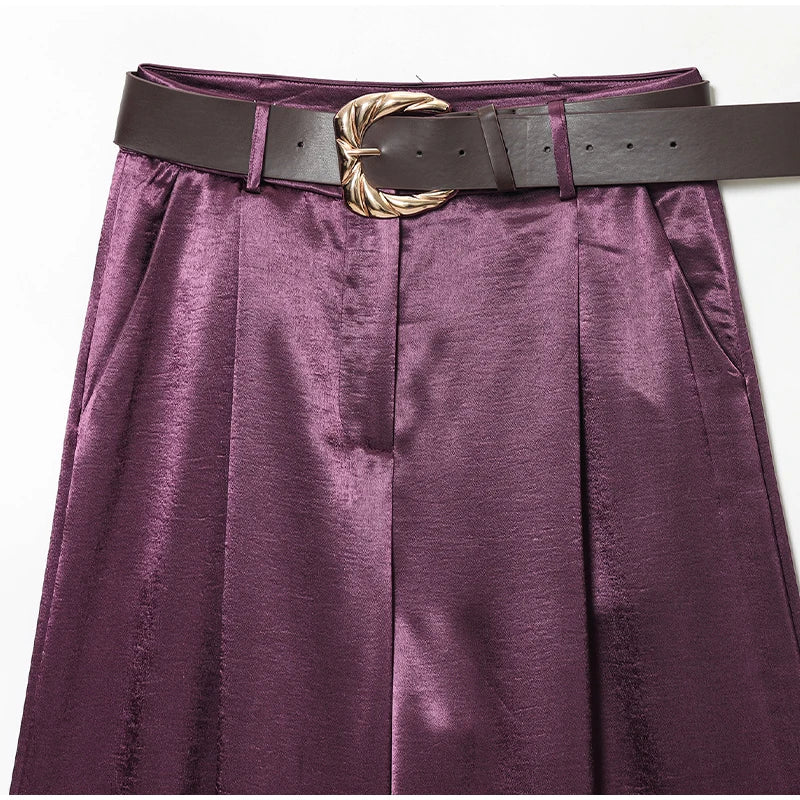 Purple skirt with a belt and gold buckle 