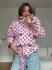 Pink polka dot double-breasted belted jacket with coffee cup