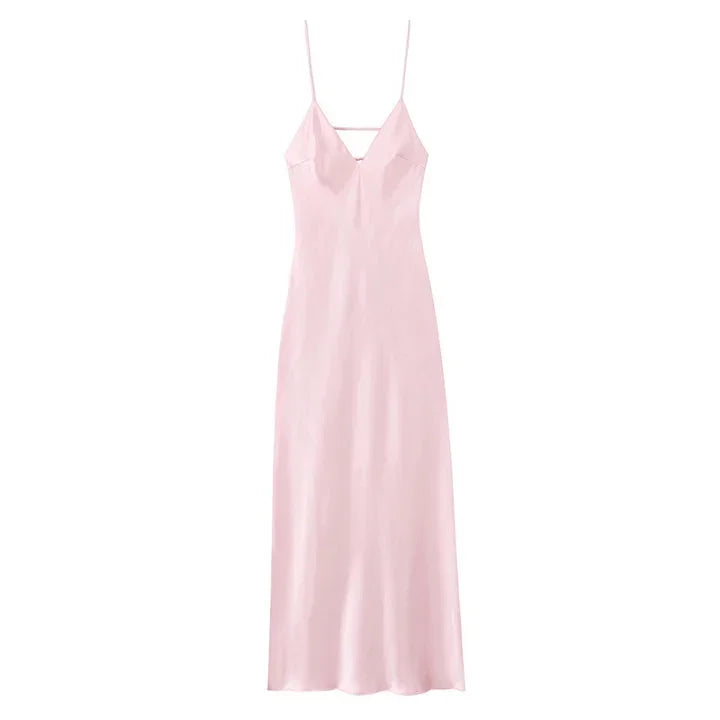 Pink slip dress on a white background