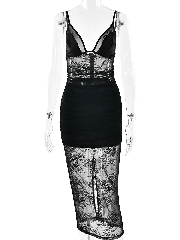 Black lace dress on a mannequin against a white background