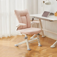 Pink ergonomic study chair with fixed white legs in home office setup