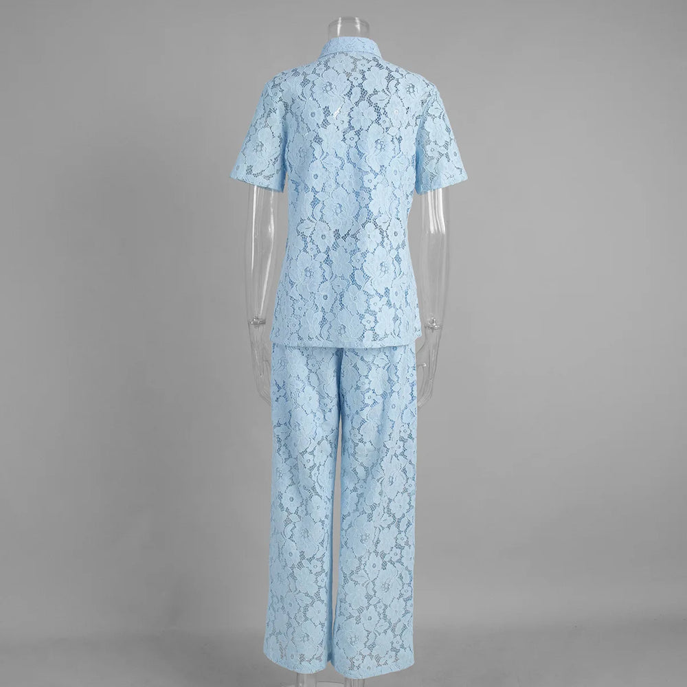 Light blue lace outfit on a mannequin against a gray background