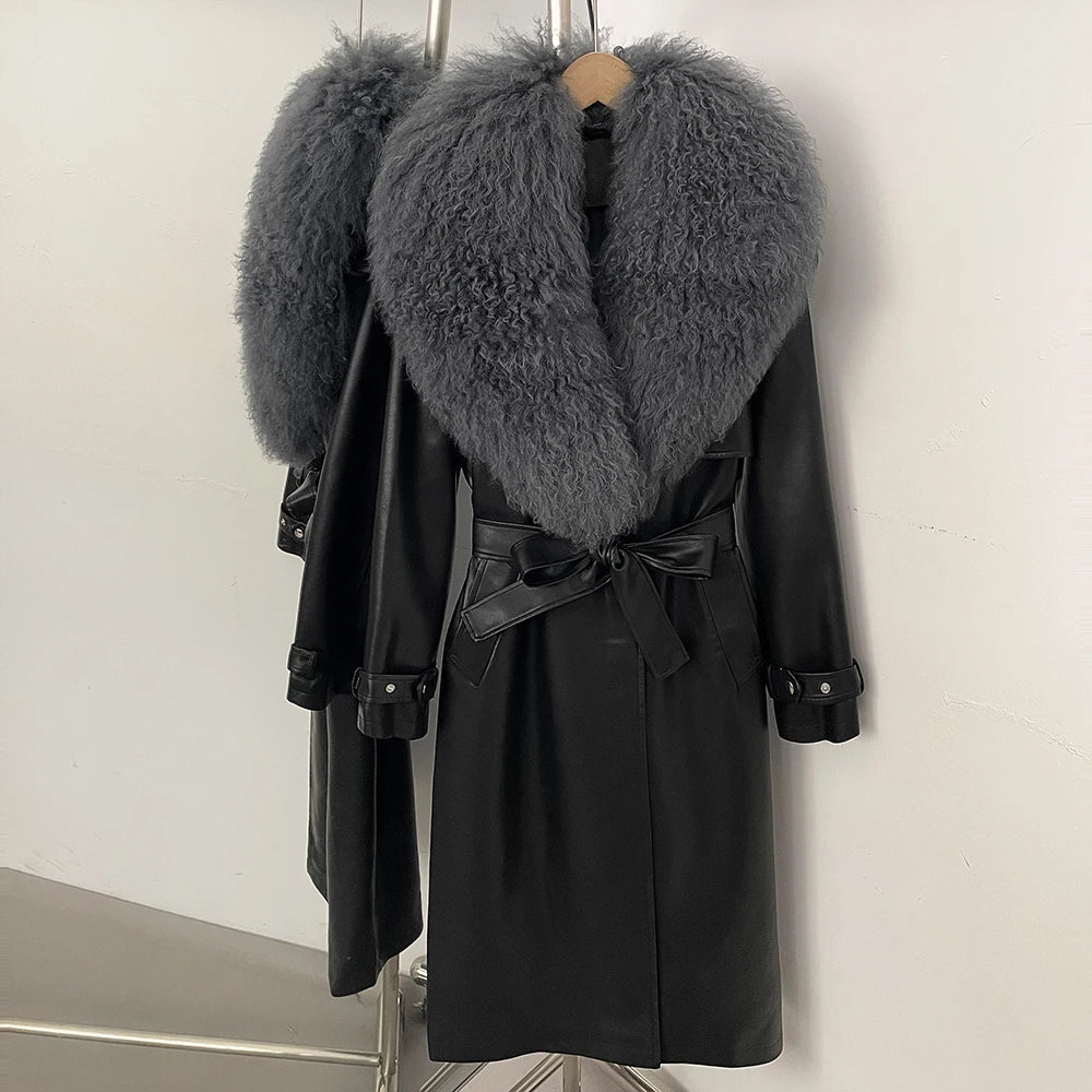 Long black faux leather belted coat with a voluminous grey fur collar.