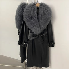 Long black faux leather belted coat with a voluminous grey fur collar.