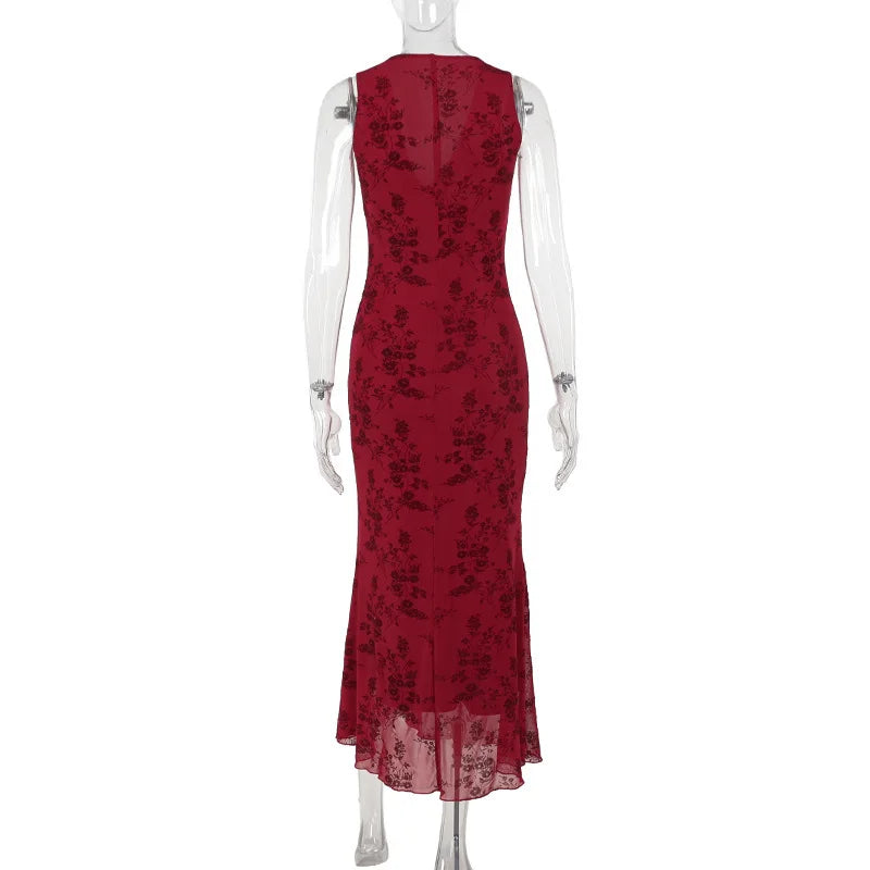 Red floral dress on a mannequin against a white background