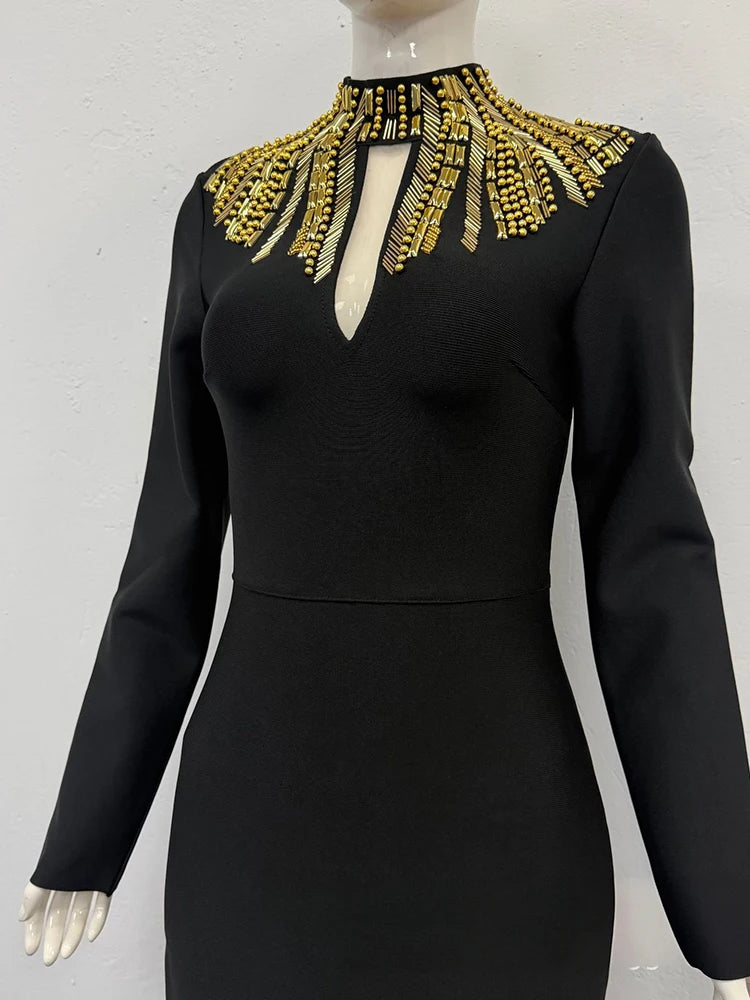 Close-up of embellished neck on black maxi dress