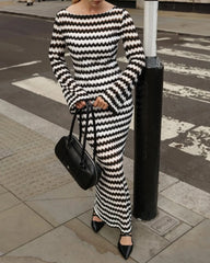 Close-up of the zigzag stripe knit pattern on a long sleeve maxi dress.