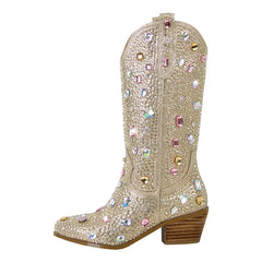 Gold cowboy boot with colorful gemstones on a white background