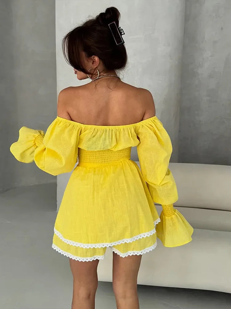 Yellow off-shoulder dress with puffed sleeves on a neutral background