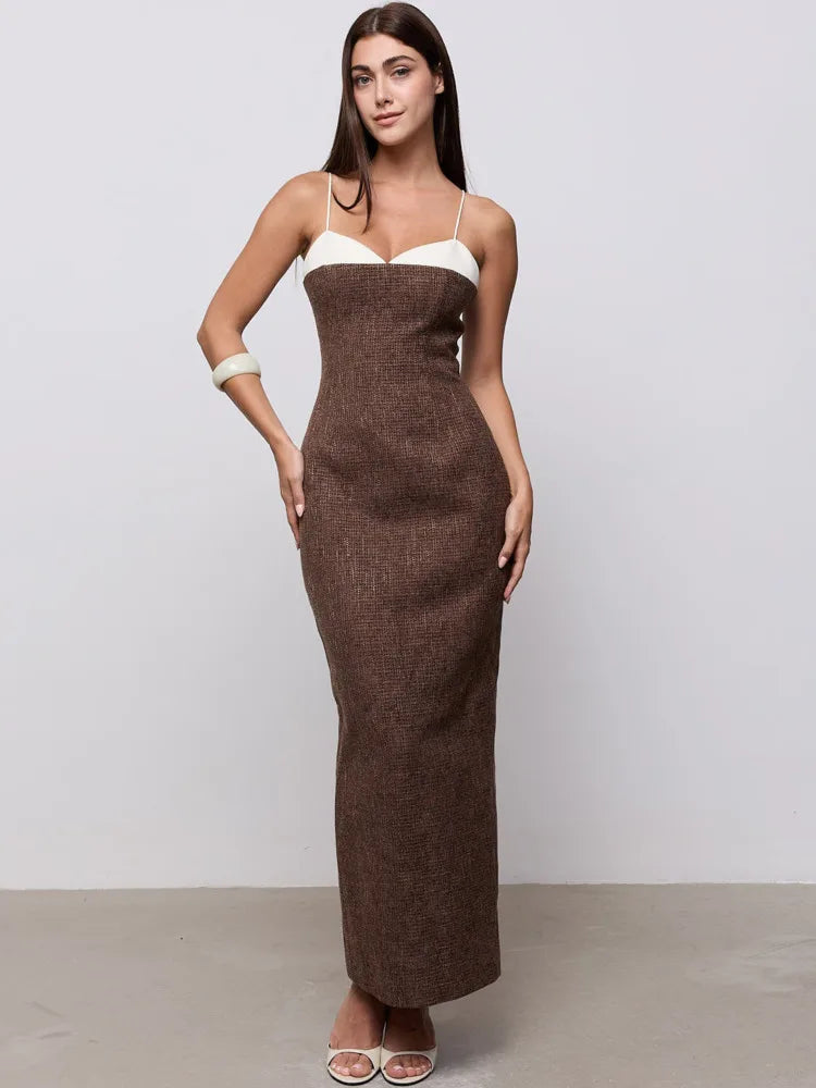 Contrast plaid maxi dress with spaghetti straps and white neckline.