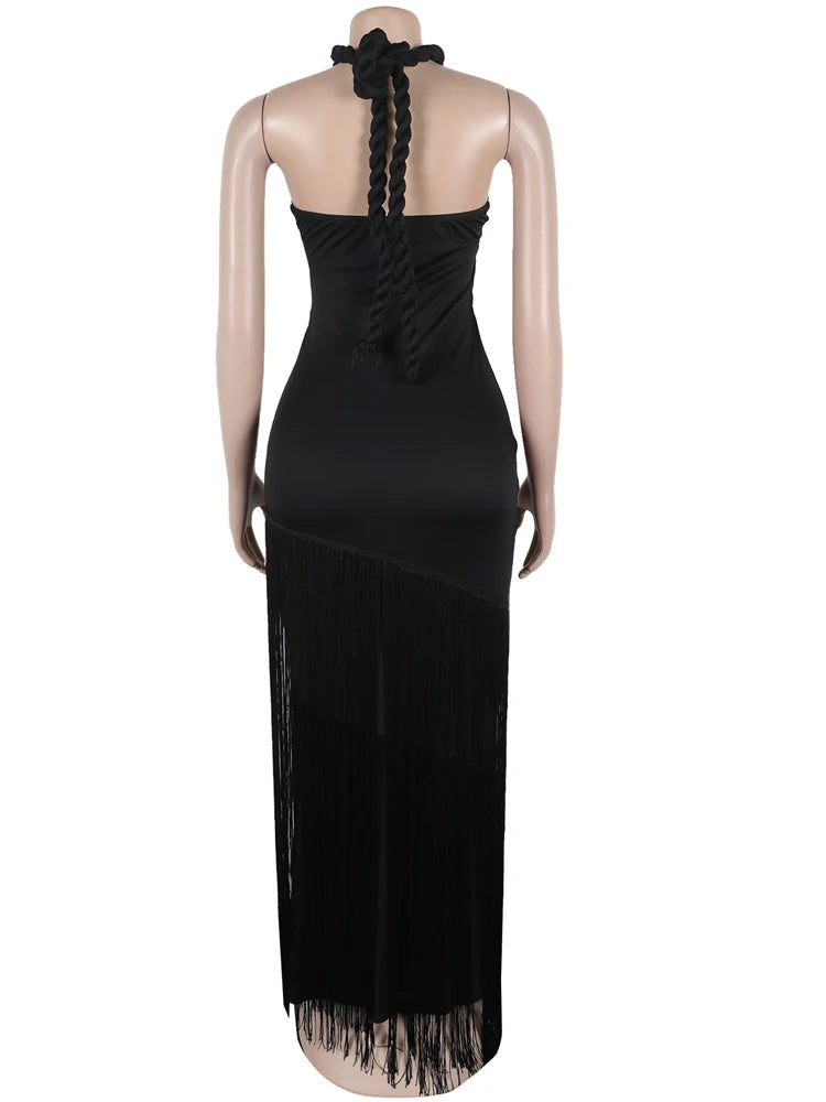 Black halter neck dress with fringe details on a mannequin against a white background