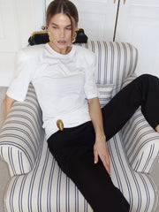 Padded shoulder ruched detail white top seated