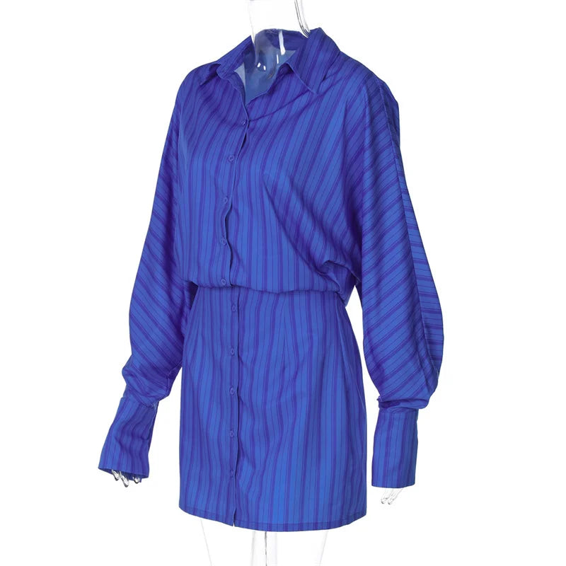 Blue striped shirt on a hanger against a white background