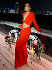 Romantic red formal gown styled for rooftop event