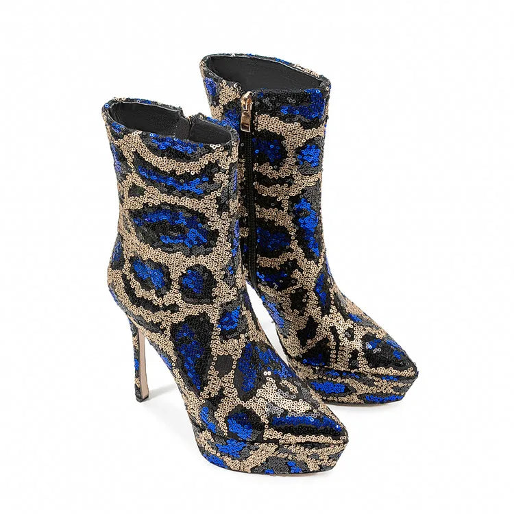 Blue and gold patterned high-heeled boots on a white background