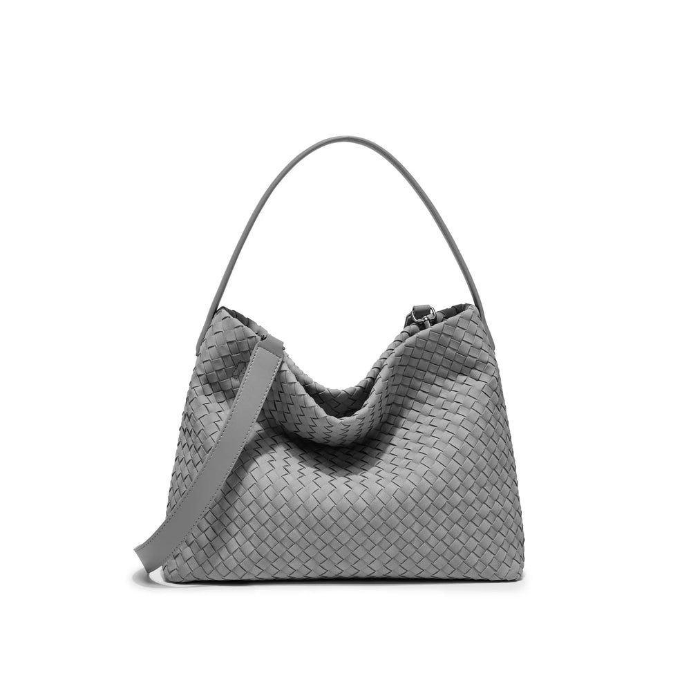 Gray woven handbag on a white background