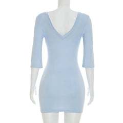 Light blue dress on a mannequin against a white background