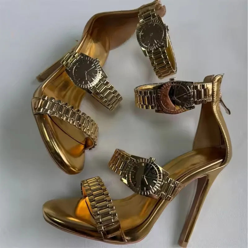 Pair of gold metal watch strap dress heels