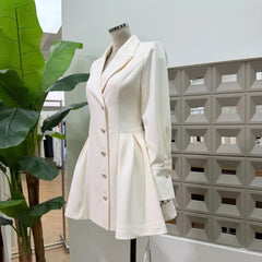 Side view of off-white tailored A-line mini dress