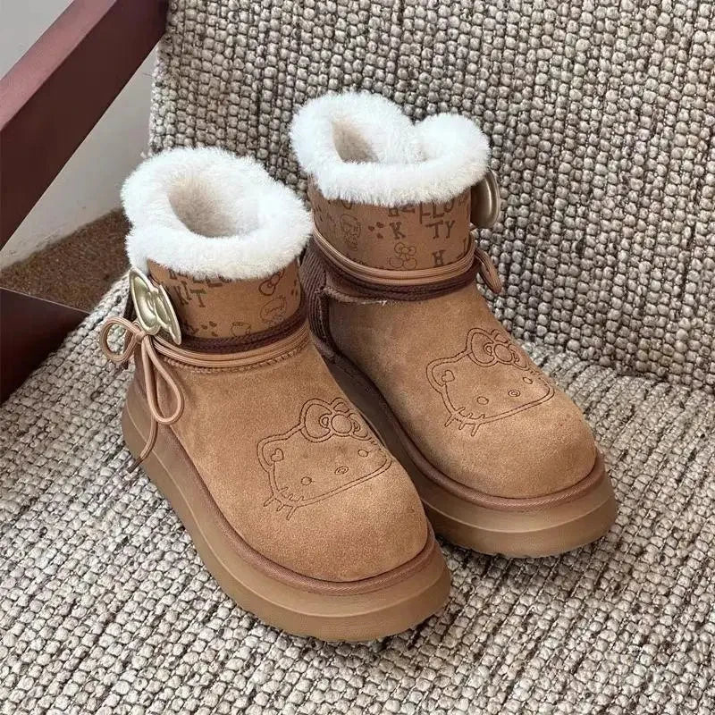 Pair of brown cartoon print faux fur lined short boots