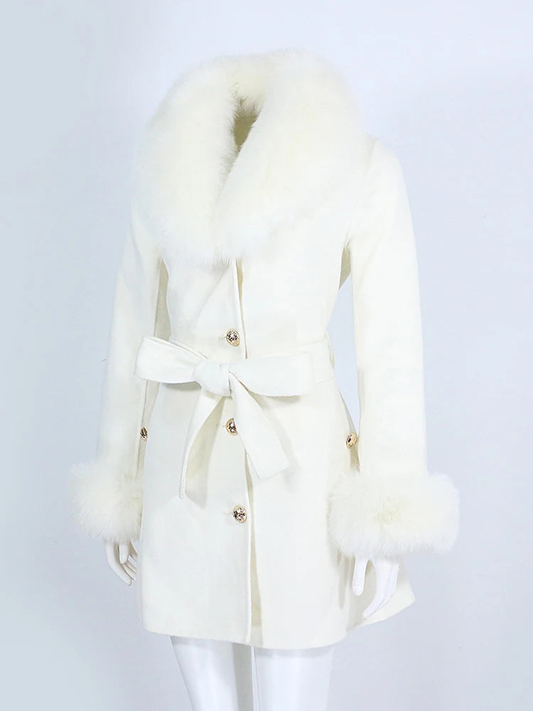 White coat with fur trim on a mannequin against a light gray background
