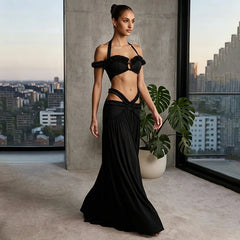 Black halter ruffle crop top and cutout maxi skirt