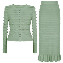 Light green knit cardigan and midi skirt set laid flat.