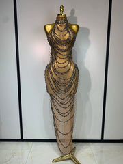 Chain embellished halter gown with sheer overlay