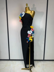 Close-up of floral appliqués on a black strapless dress