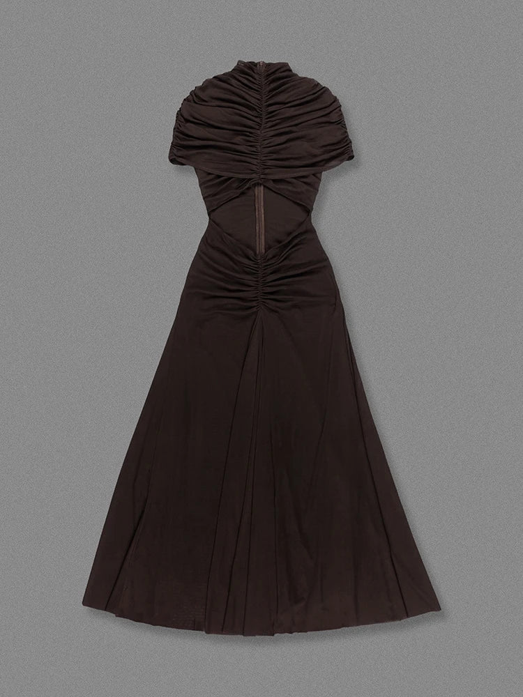Brown dress with ruched bodice on a gray background
