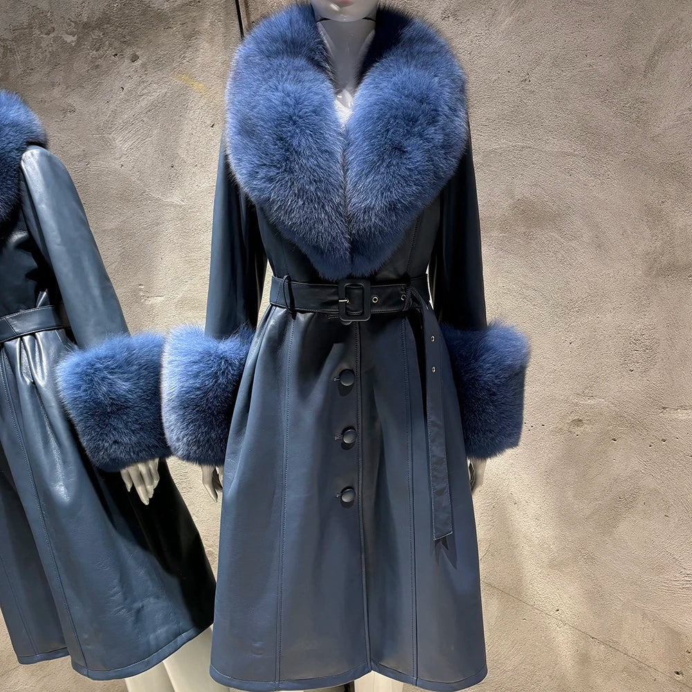 Gray coat with blue fur collar and cuffs on a mannequin against a gray background