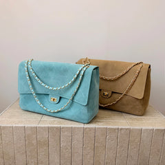 Light blue and tan quilted suede flap shoulder bags