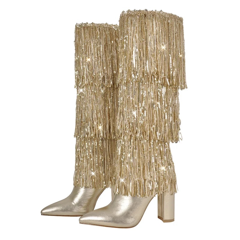 Gold pointed toe knee high boots with layered fringe and chunky block heel