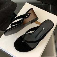 Black flock wedge heel flip flop sandals
