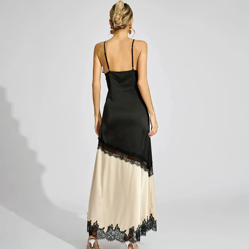 Woman wearing a black and beige dress with lace details