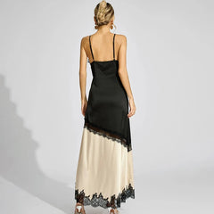 Woman wearing a black and beige dress with lace details