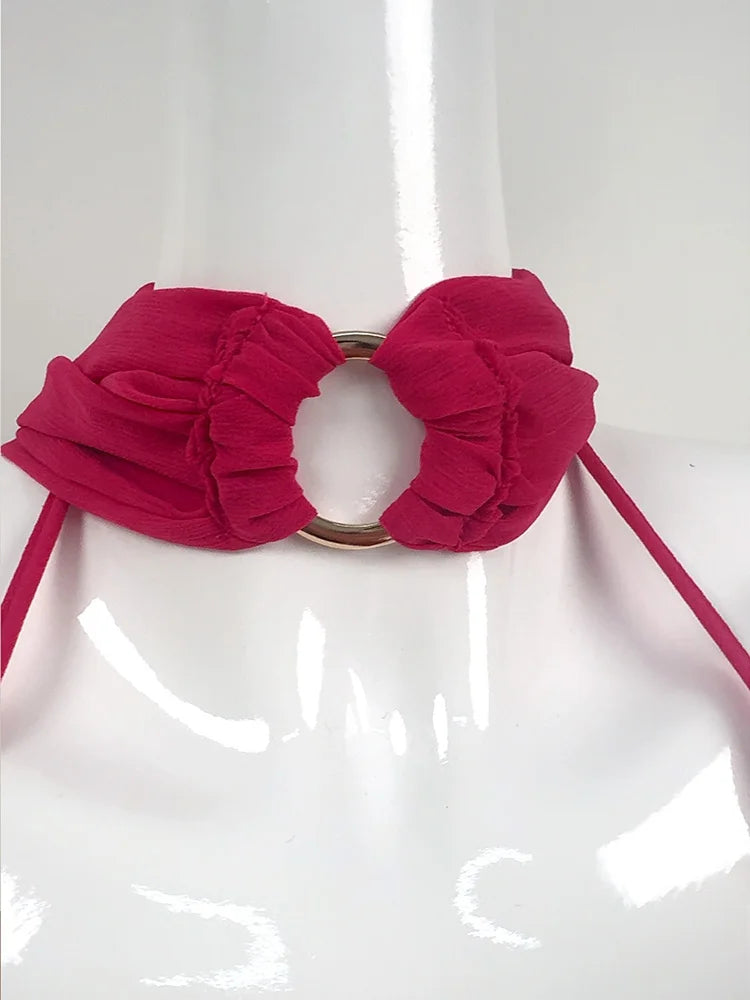Rose red floral belt on a white mannequin