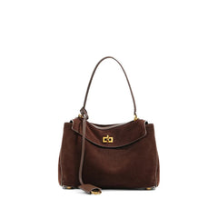 Brown handbag with a gold clasp on a white background