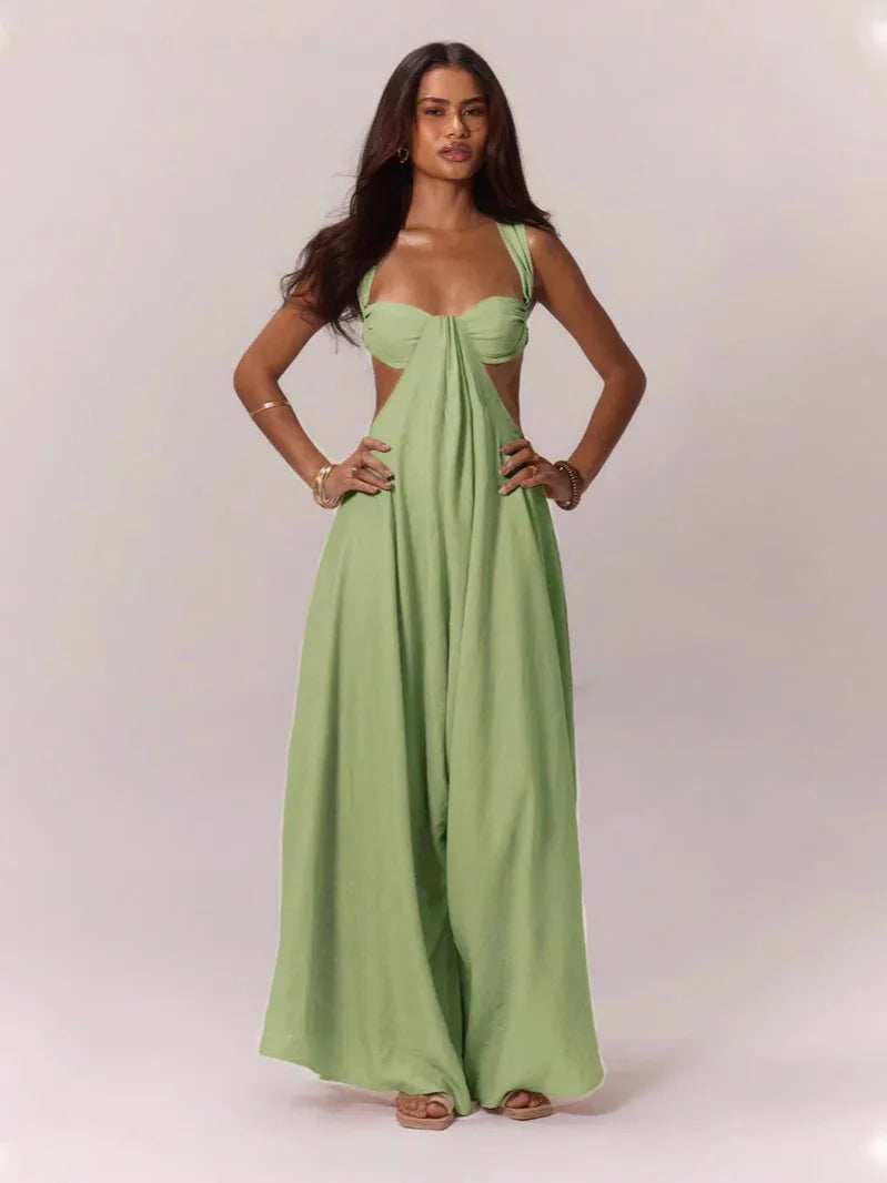 Woman wearing a green jumpsuit on a white background