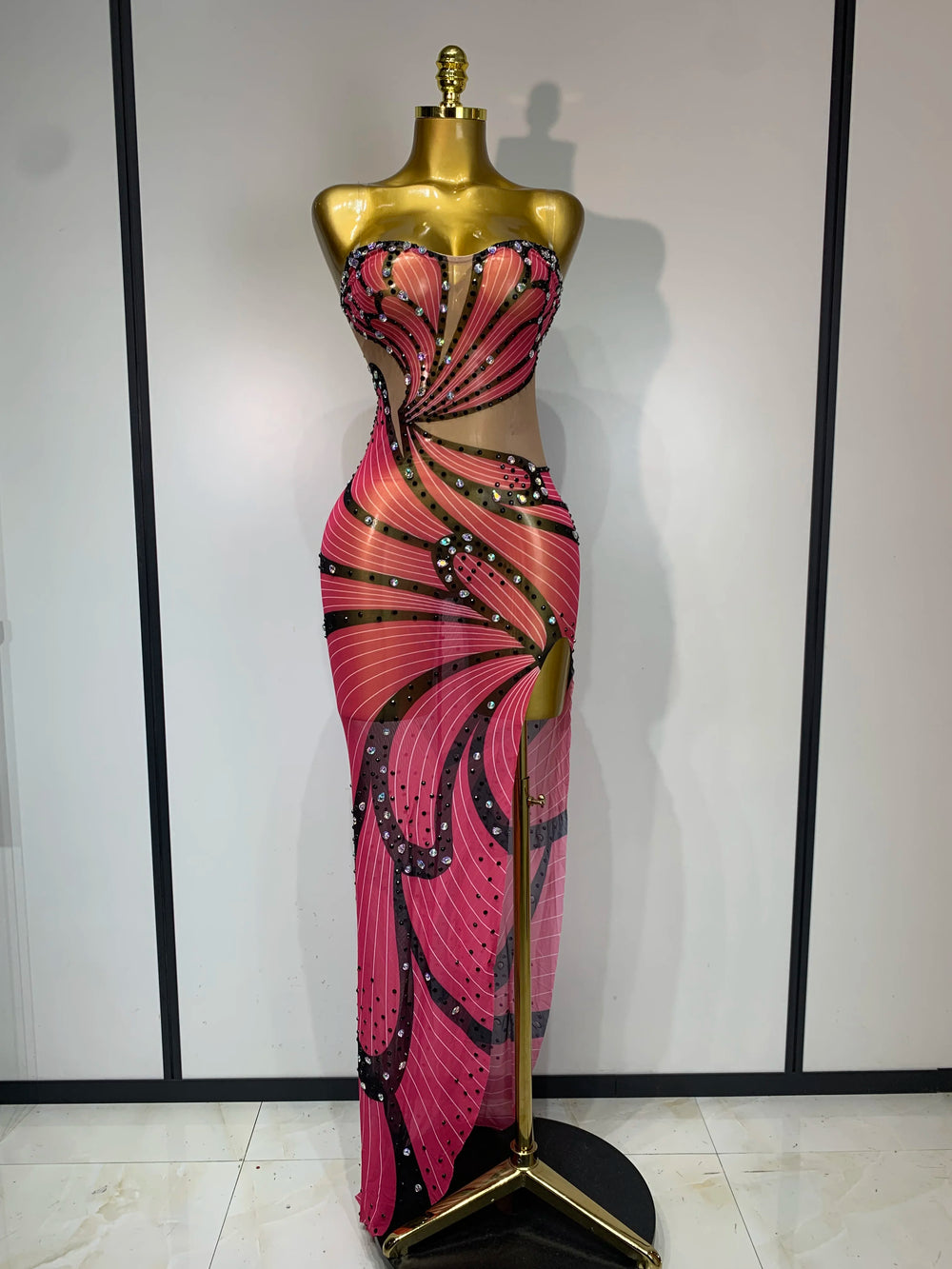 Strapless maxi dress with butterfly print and rhinestone embellishments.