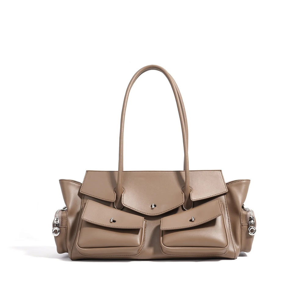 Beige handbag with a strap on a white background